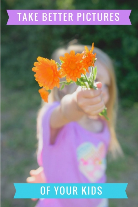 image of little girl with orange flowers pinterest image